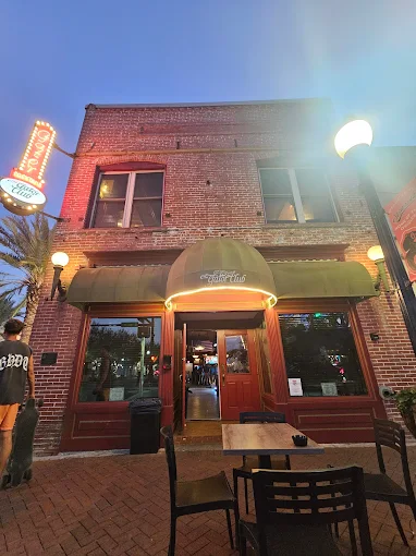 The Gator Club facade at night